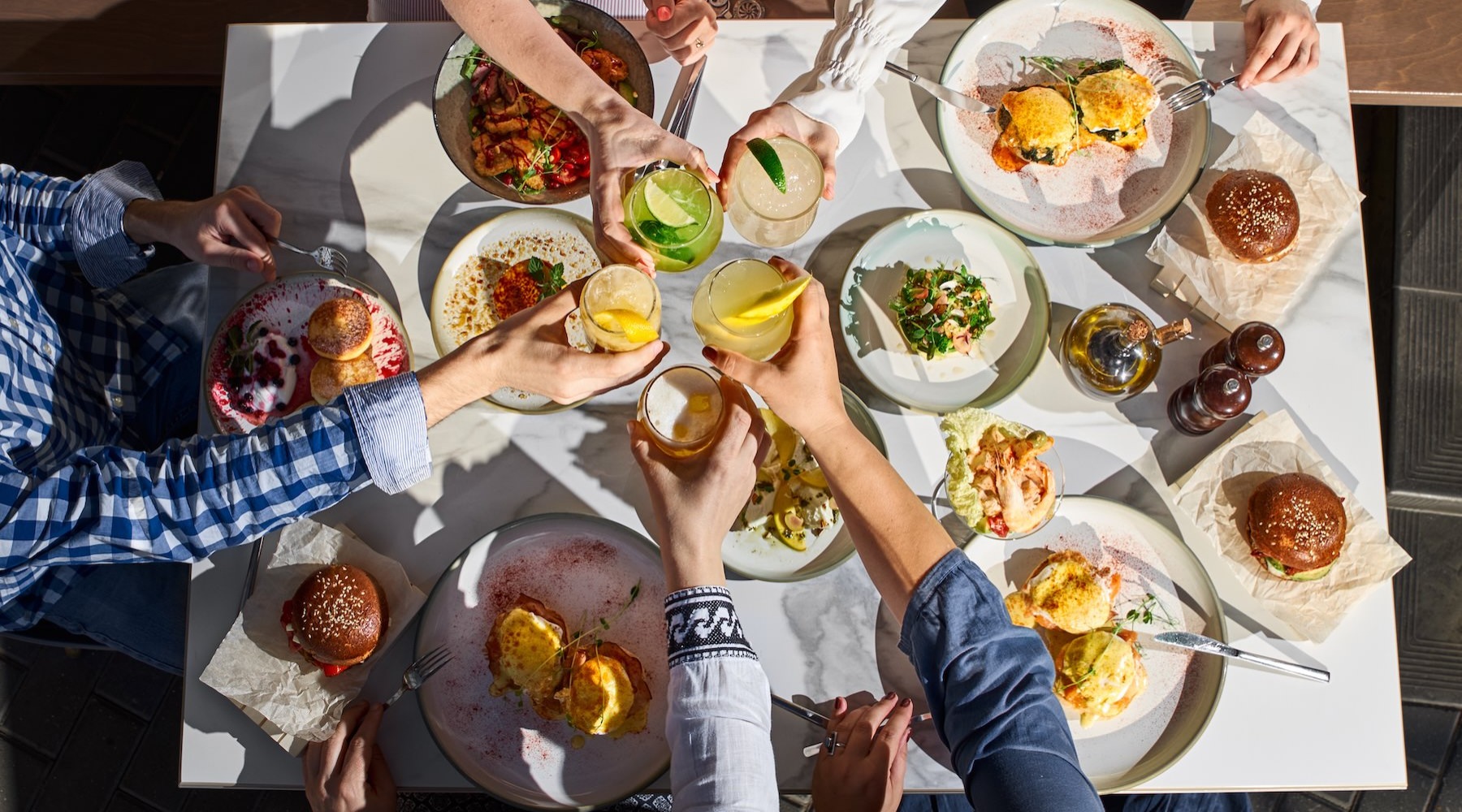 people eating and drinking