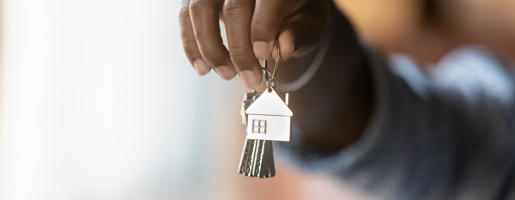a person holding a key