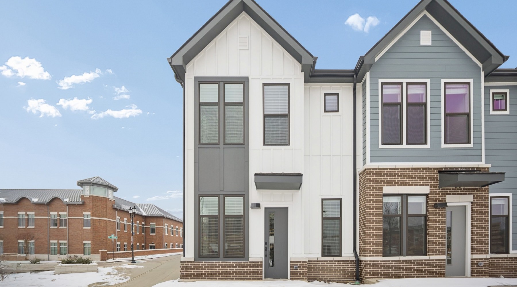 a building with windows and snow