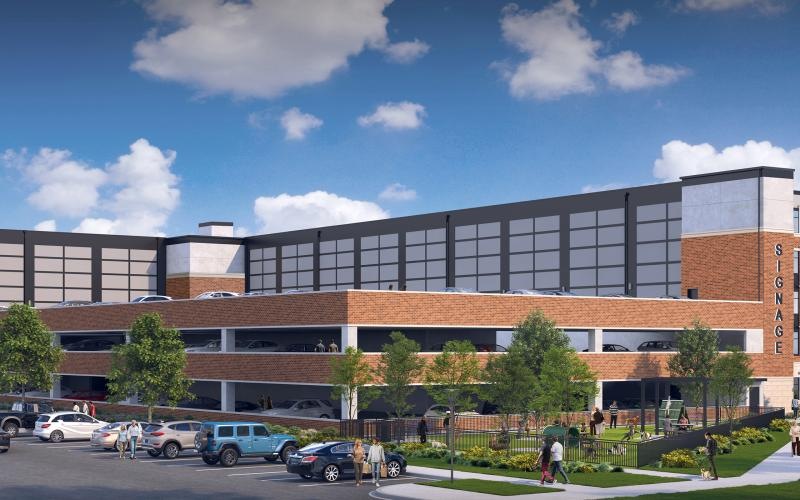 a building with cars parked in front