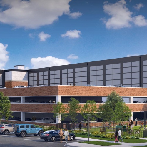 a building with cars parked in front